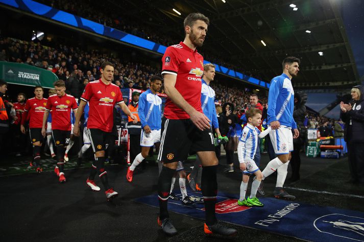 Michael Carrick var fyrirliði í bikarleiknum á móti Hudderfield.