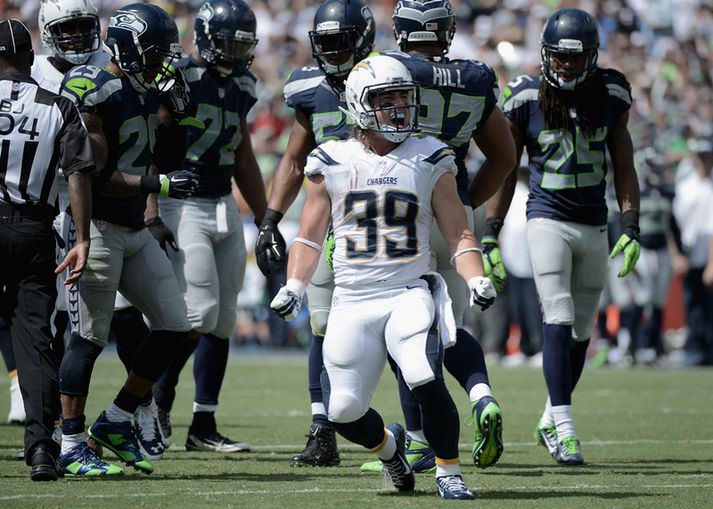 Danny Woodhead, hlaupari San Diego, fagnar í gær.