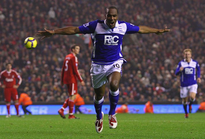 Cameron Jerome fagnar marki sínu á Anfield-leikvanginum í kvöld.