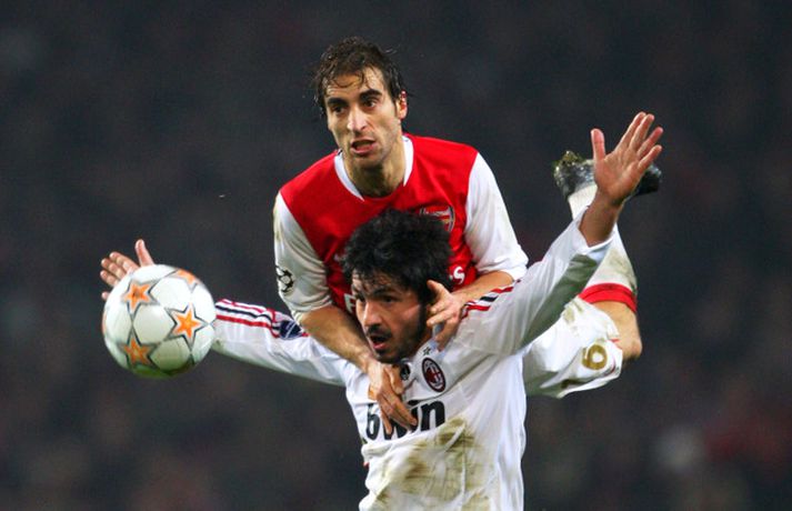 Flamini hér með Arsenal gegn Milan sem hann er á mála hjá í dag. Nú er hann sagður á leið aftur til Englands.