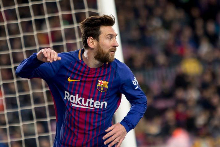 Messi fagnar sögulegu marki sínu í gær.