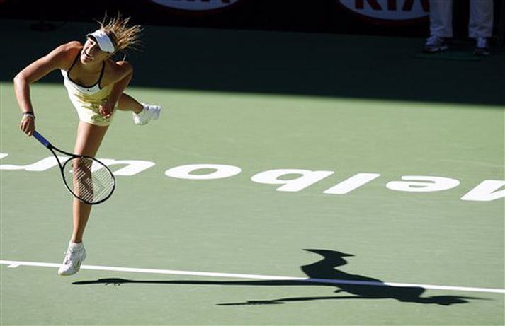 Maria Sharapova á fleygiferð í leiknum gegn KimClijsters í morgun.