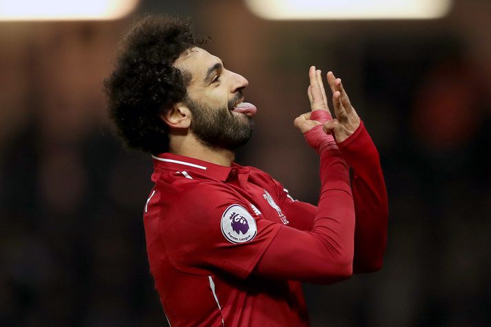 Mohamed Salah fagnar marki með Liverpool.