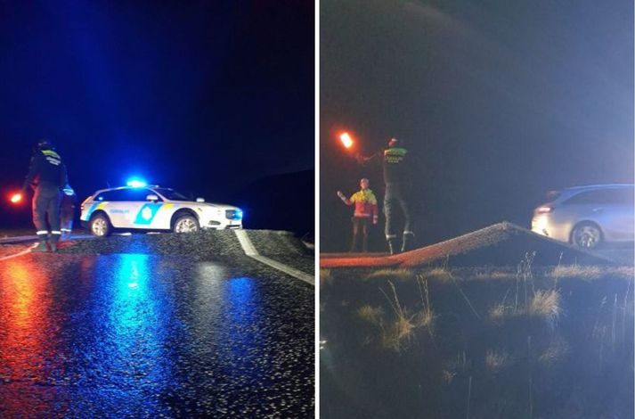 Myndir af lögreglumönnum og björgunarsveitarfólki á vettvangi en búið er að loka Grindavíkurvegi tímabundið vegna stórrar sprungu sem myndaðist á veginum.