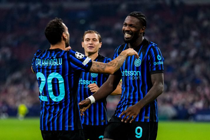 Thuram skoraði bæði mörk Inter eftir stoðsendingar Calhanoglu. 