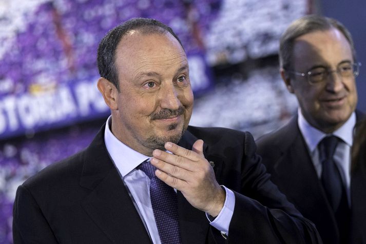 Benitez og forsetinn Florentino Perez.