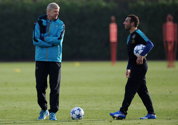 Arsene Wenger og  Santi Cazorla.