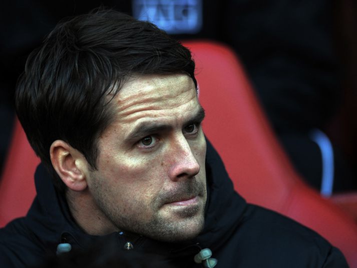 Michael Owen á bekknum.