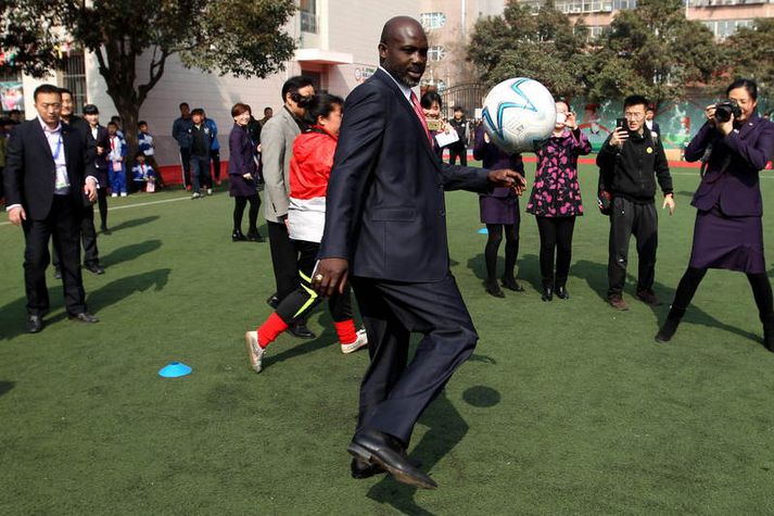 George Weah, forseti Líberíu og fyrirliði fótboltalandsliðs þjóðarinna í gær.