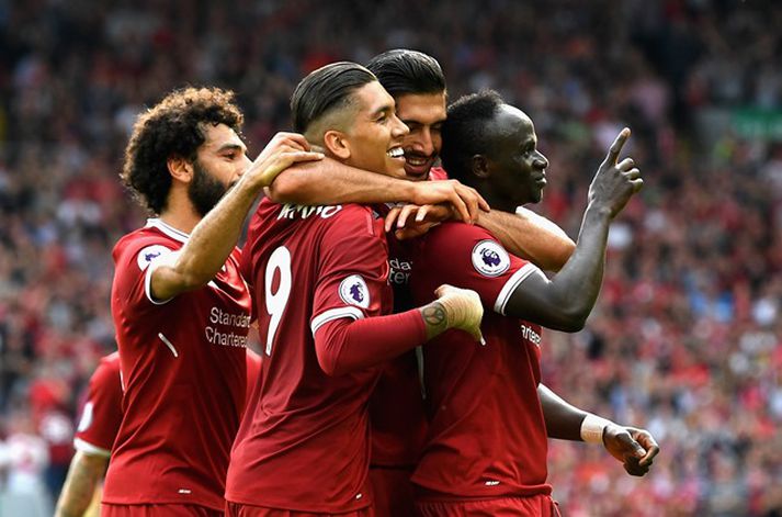 Liverpool-menn fagna einu fjögurra marka sinna gegn Arsenal.