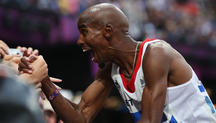 Mo Farah fagnar sigri sínum.