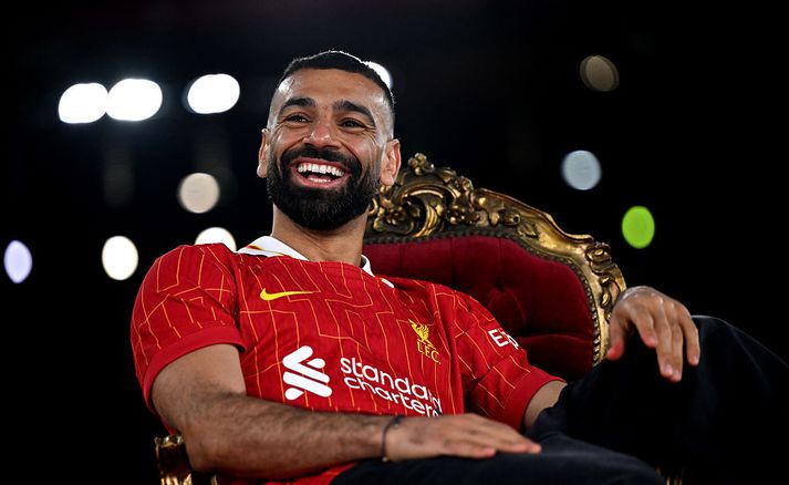 Mohamed Salah hæstánægður með nýja samninginn við Liverpool.