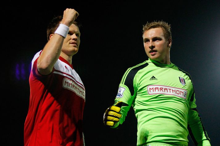 Fulham-mennirnir John Arne Riise og David Stockdale fagna sigri í kvöld.