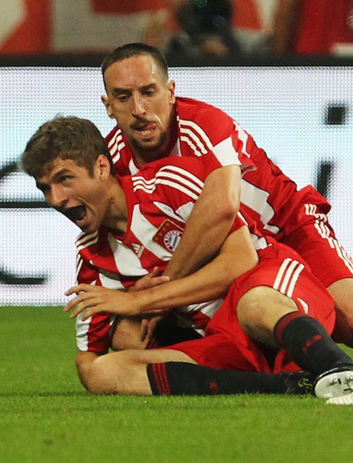 Ribery fagnar marki.