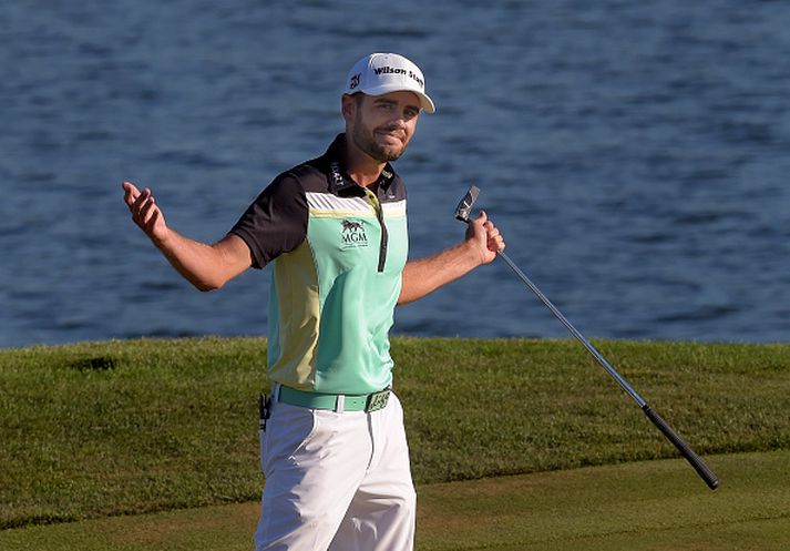 Troy Merritt fagnar sigrinum í gær.