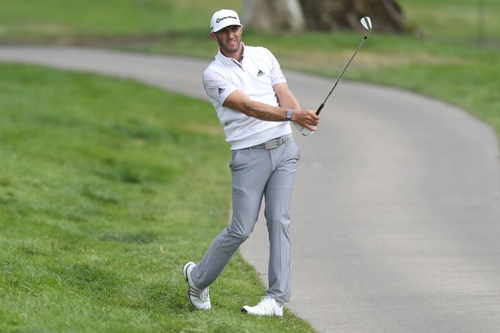 Dustin Johnson er efstur fyrir lokadaginn.