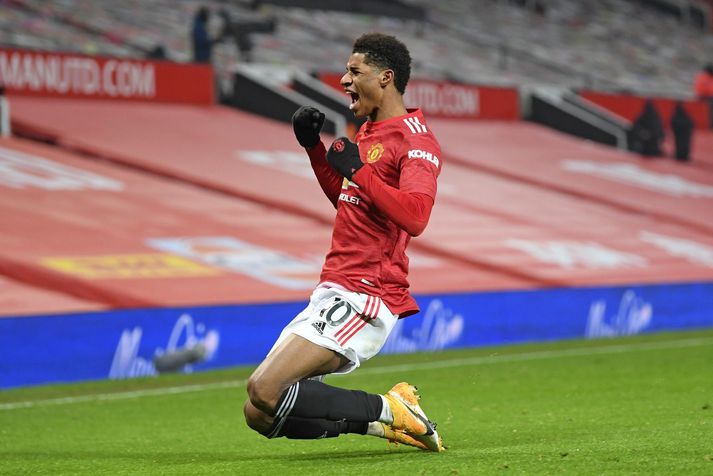 Marcus Rashford fagnar hér sigurmarki sínu fyrir Manchester United á móti Wolverhampton Wanderers á Old Trafford í gærkvöldi.