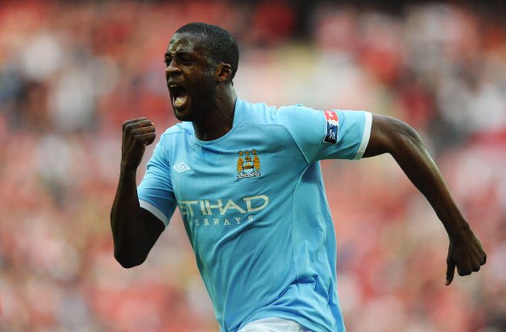 Yaya Touré fagnar hér marki sínu á Wembley.