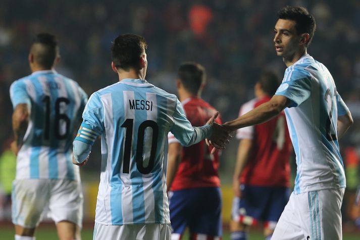 Pastore og Messi fagna marki.