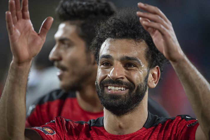 Mohamed Salah fagnar hér sigri Egypta í undanúrslitaleiknum í gær.