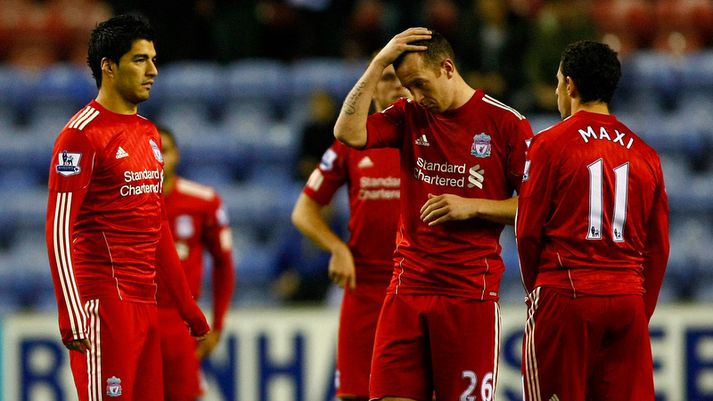 Luis Suarez með liðsfélögum sínum í gær.
