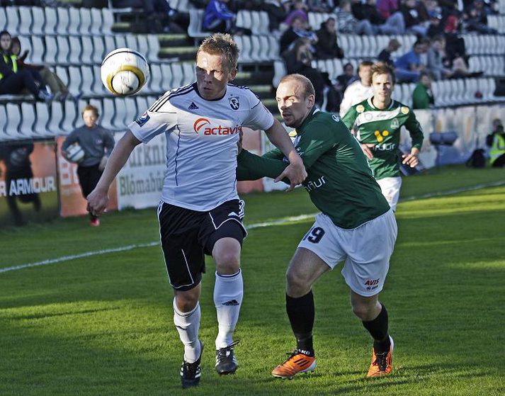 Atli Viðar Björnsson, FH, og Blikinn Kristinn Jónsson í fyrri leik liðanna í sumar.