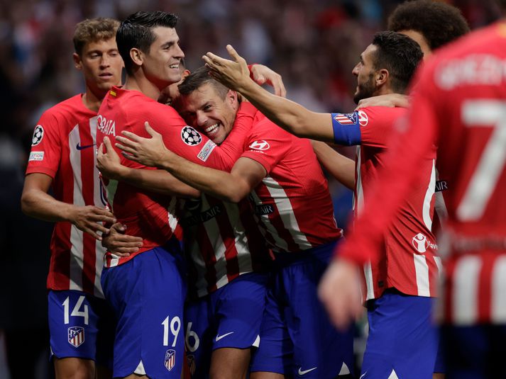 Leikmenn Atletico fagna öðru marki Alvaro Morata í leiknum gegn Feyenoord í dag.