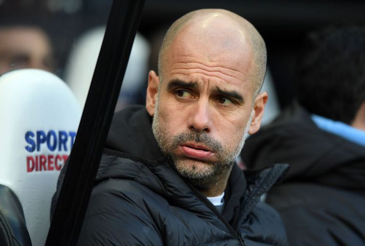 Guardiola með svipbrigði um helgina.