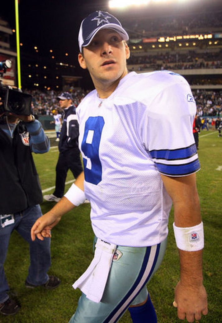 Tony Romo og félagar í Dallas komust ekki áfram í úrslitakeppnina.