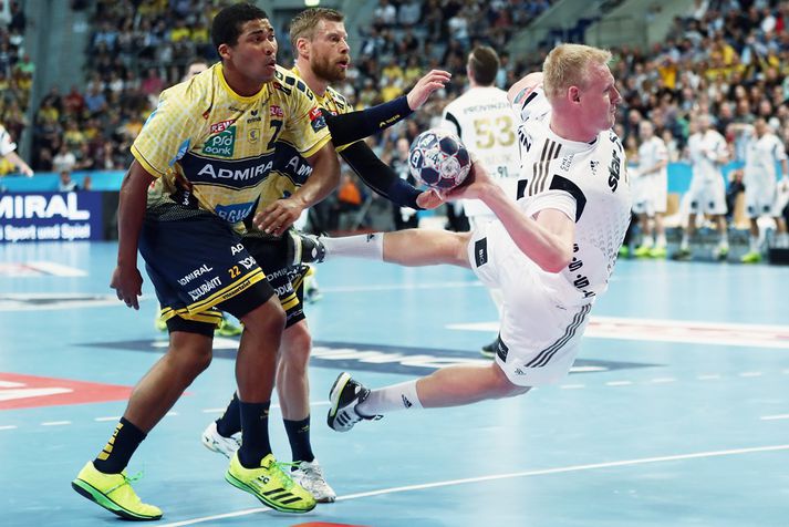 Mensah Larsen og Guðjón Valur eru hér saman í leik gegn Kiel.