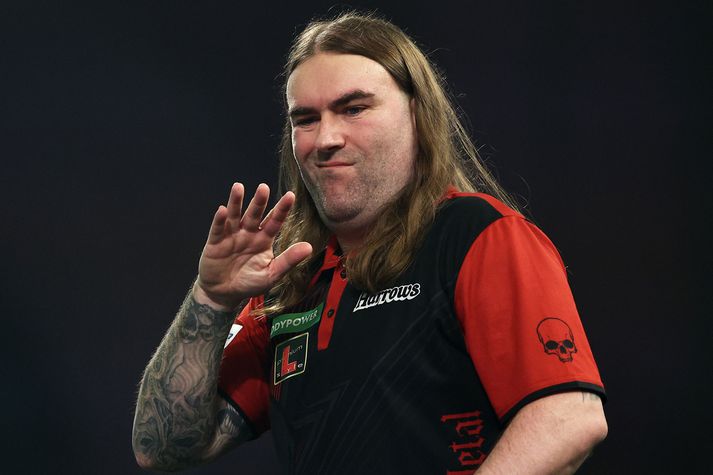 Ryan Searle var sá fyrsti til að tryggja sér sæti í átta manna úrslitunum á HM.