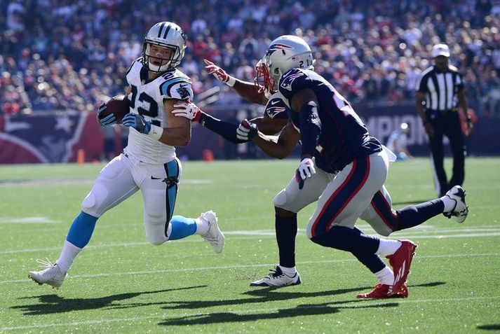 Christian McCaffrey á fullri ferð með Carolina Panthers liðinu í leik á móti New England Patriots.