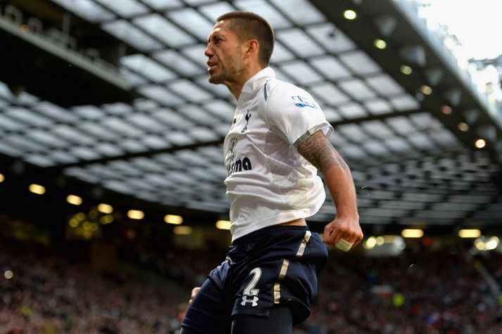 Clint Dempsey fagnar marki í leik með Tottenham.
