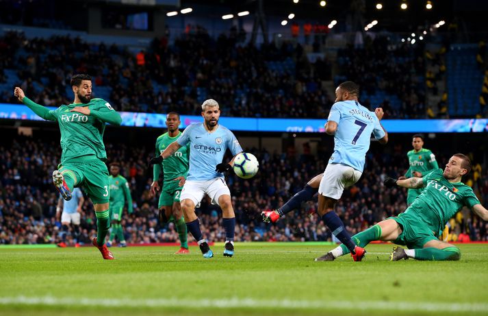 Sterling skorar eitt þriggja marka sinna gegn Watford.