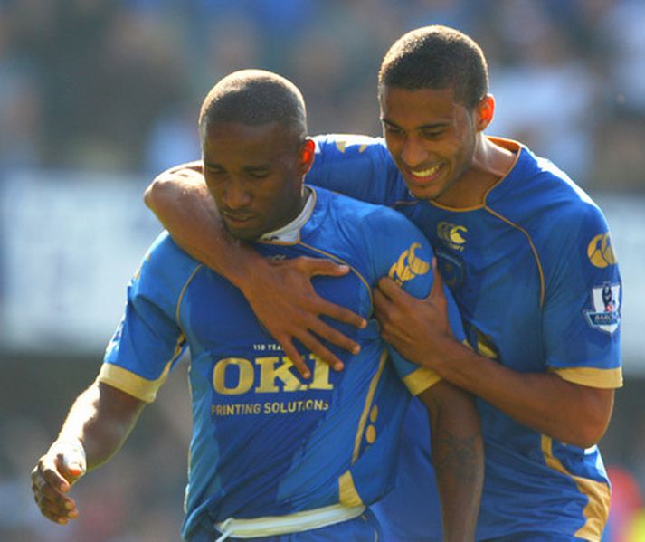 Jermain Defoe, til vinstri, fagnar marki með Armand Traore.