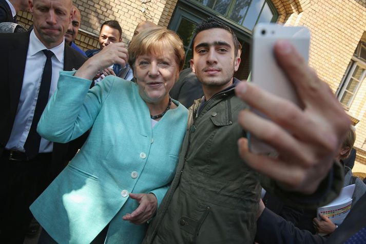 Angela Merkel hefur að undanförfnu þurft í auknum mæli að bregðast við andspyrnu við komu flóttamanna til Þýskalands.