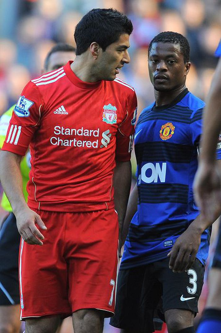 Fyrir 119 dögum. Patrice Evra og Luis Suárez í leik Manchester United og Liverpool á Anfield í október.afp