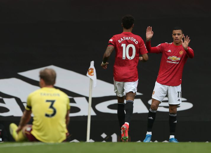 Marcus Rashford og Mason Greenwood fagna í apríl 2021.