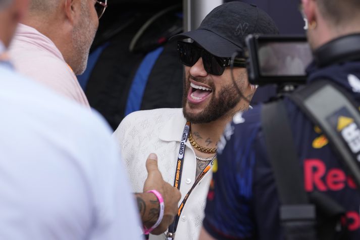 Brazilian soccer player Neymar walks near the track prior to the Monaco Formula One Grand Prix, at the Monaco racetrack, in Monaco, Sunday, May 28, 2023. (AP Photo/Luca Bruno)