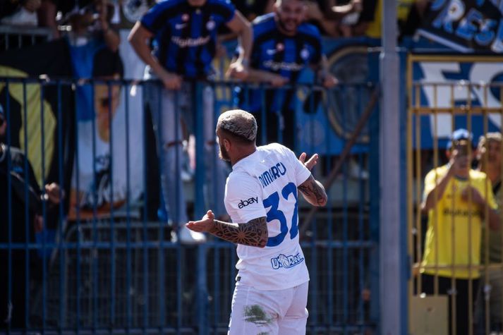 Federico Dimarco fagnar marki sínu gegn Empoli í dag.