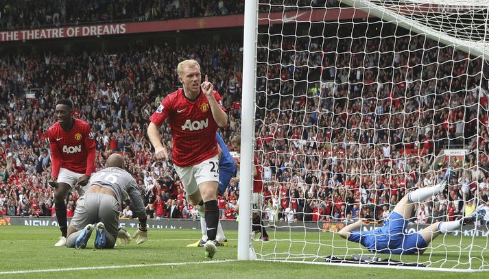 Paul Scholes fagnar marki sínu í dag.