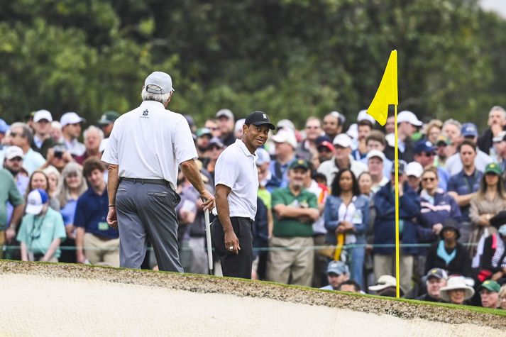 Endurkoma Tiger Woods hefur vakið mikla athygli eins og sjá mátti á æfingahring hans. Færri komust að en vildu.