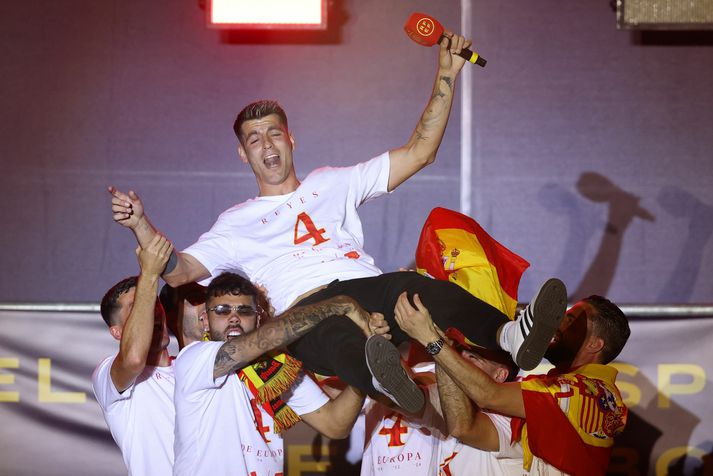Alvaro Morata fagnaði með látum í Madríd í gær.