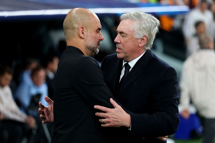 Pep Guardiola og Carlo Ancelotti sjást hér þegar þeir mættust sem stjórar Manchester City og Real Madrid.