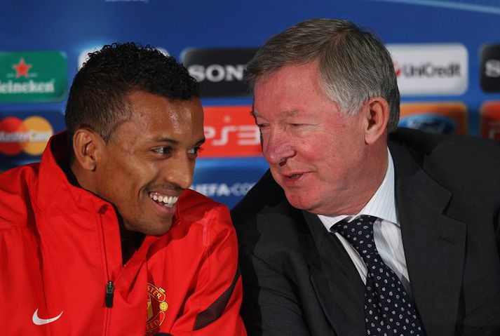 Nani og Sir Alex Ferguson voru léttir á blaðamannafundi.
