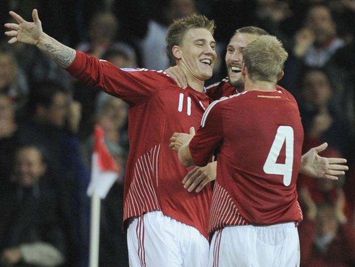 Nicklas Bendtner fagnar marki sínu á móti Portúgal um helgina.