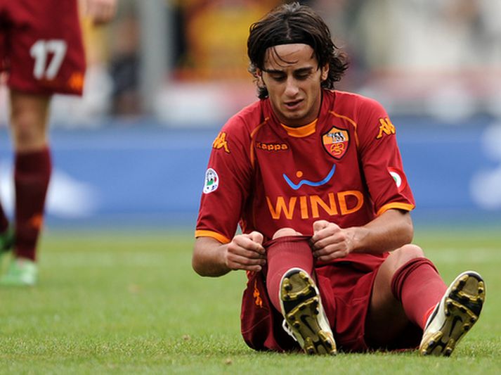 Alberto Aquilani spilar líklega ekki með Liverpool fyrr en í október.