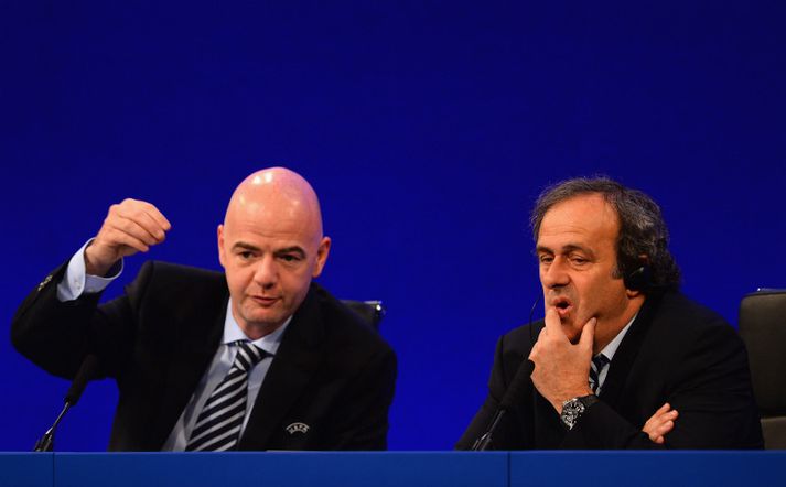 Michel Platini, forseti UEFA, til hægri með Gianni Infantino aðalritara.