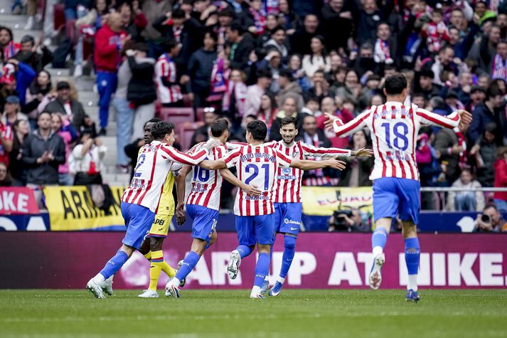 Leikmenn Atletico Madrid fagna marki Molina í dag.