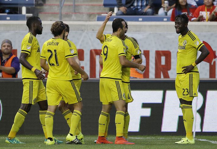 Liðsfélagar Kristins fagna hér marki Kei Kamara.
